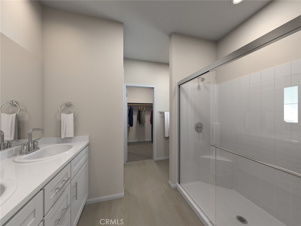 663 Joseph Privado Ontario, CA 91761 - Photo 6 of 13 a bathroom with a shower sink vanity and mirror