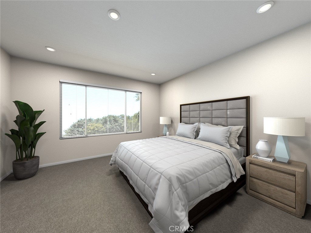 663 Joseph Privado Ontario, CA 91761 - Photo 7 of 13 a bed room with a bed and a large window