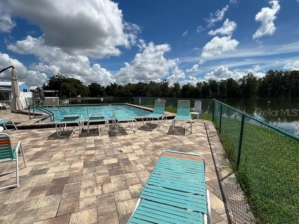 a view of a lake with a terrace