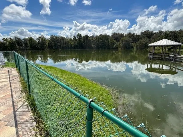 a view of a lake in middle of a city