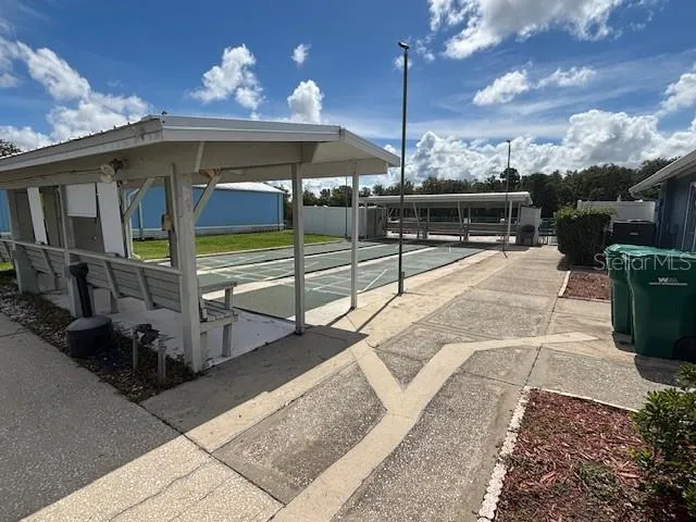 a view of a porch with furniture