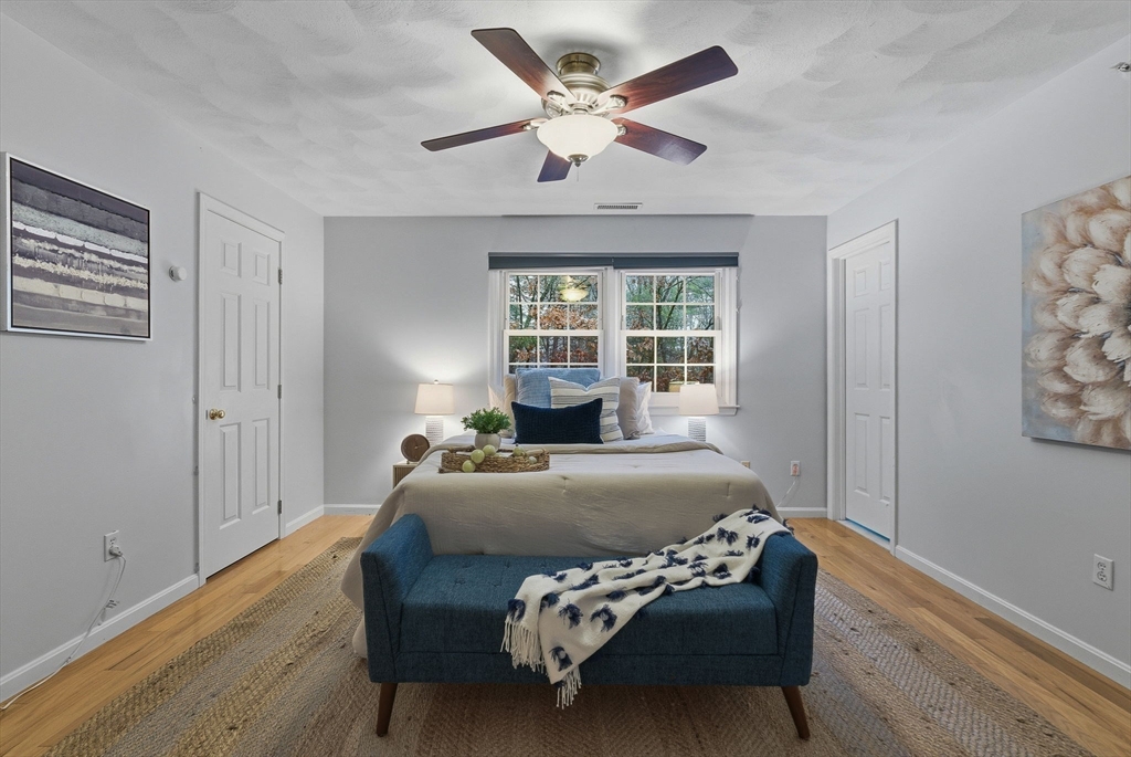5 Aspen Circle Bedford, MA 01730 - Photo 16 of 28 a bedroom with a bed and window