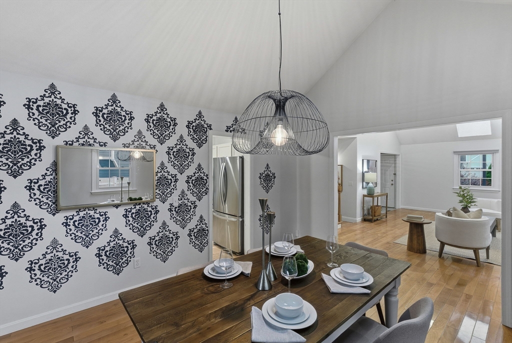 5 Aspen Circle Bedford, MA 01730 - Photo 2 of 28 a view of a dining room with furniture wooden floor and chandelier