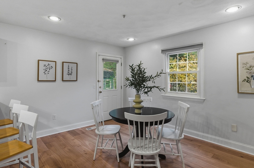 5 Aspen Circle Bedford, MA 01730 - Photo 9 of 28 a view of a dining room with furniture and window