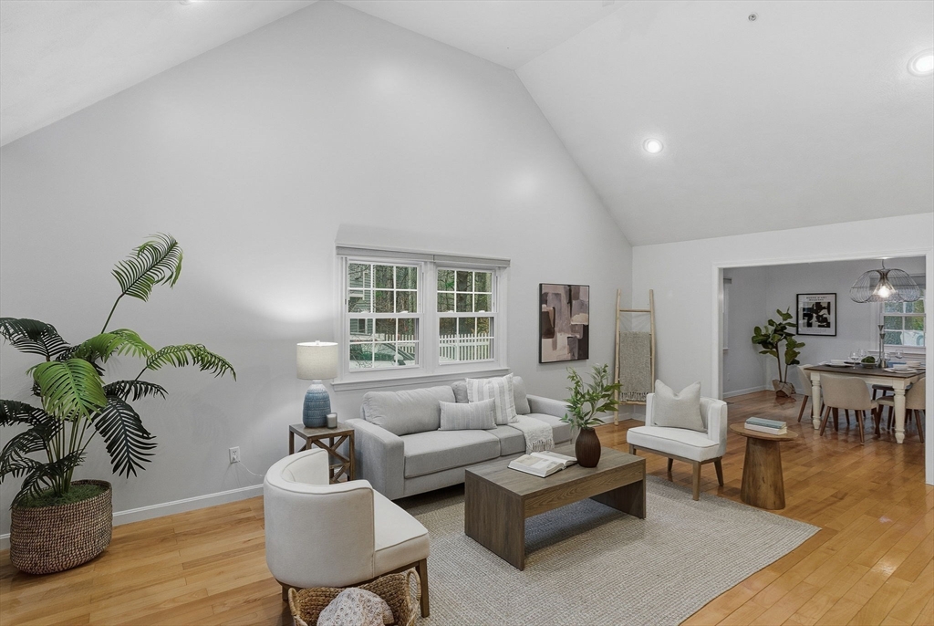 5 Aspen Circle Bedford, MA 01730 - Photo 10 of 28 a living room with furniture and a potted plant