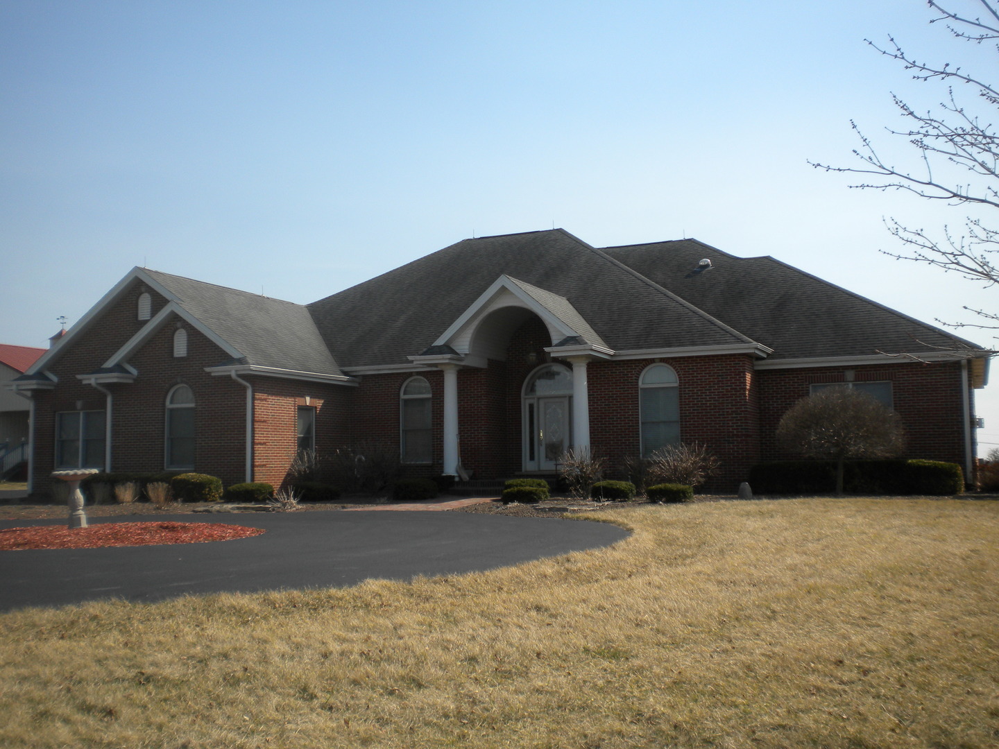 505 East Corning Road Beecher, IL 60401 - Photo 2 of 42 a front view of a house with a yard