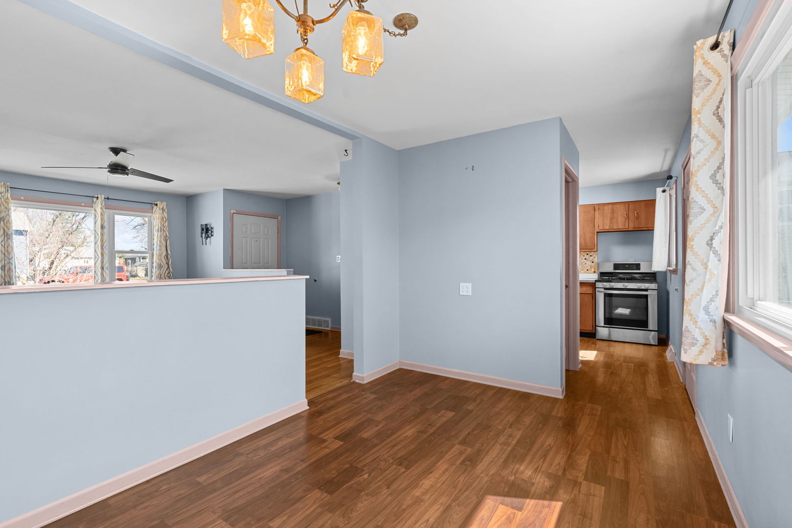 8911 Ramble Road Wonder Lake, IL 60097 - Photo 7 of 36 a view of a kitchen cabinets and wooden floor