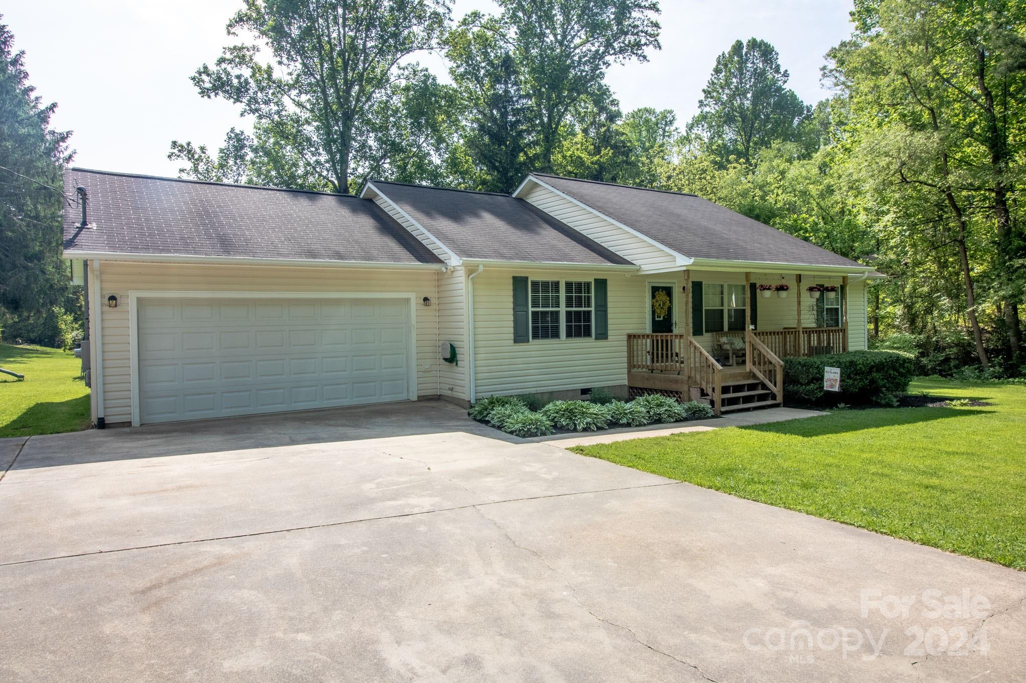 21 Norman Road Fletcher, NC 28732 - Photo 20 of 21 a front view of house with yard and green space