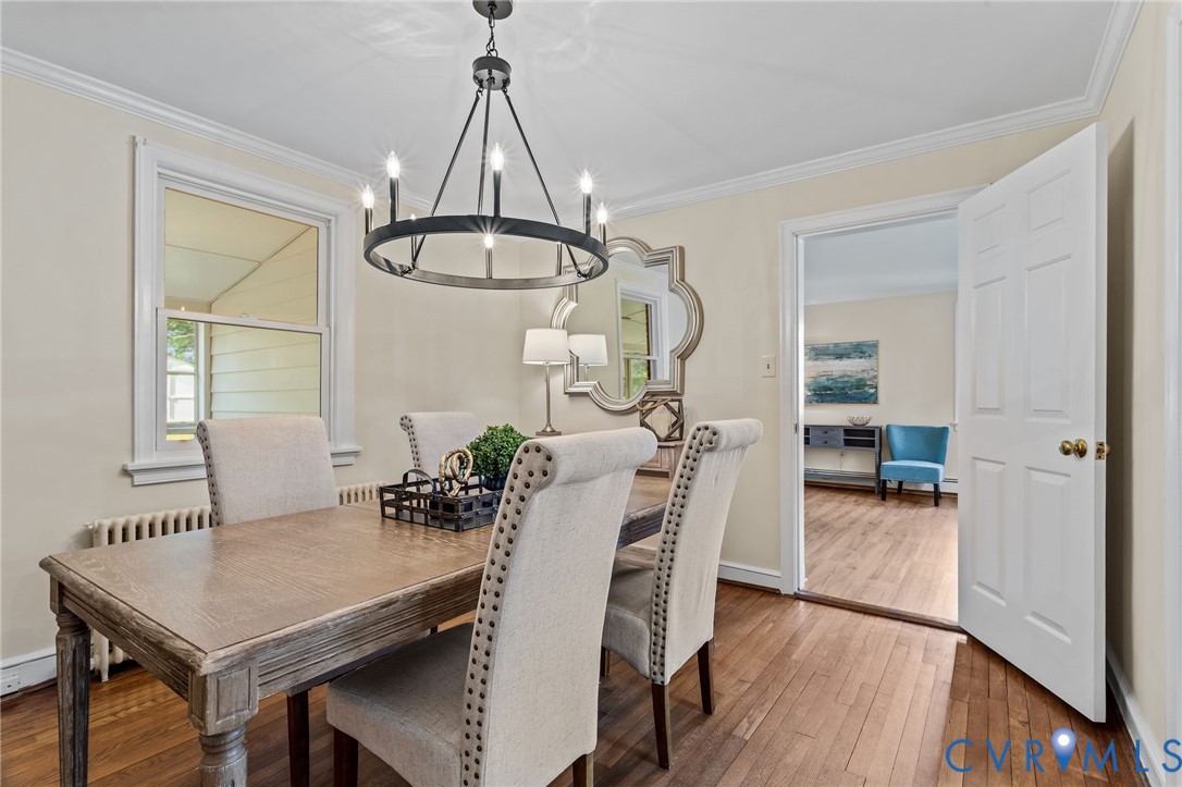 4804 Morrison Road Richmond, VA 23230 - Photo 12 of 48 a view of a dining room with furniture window and wooden floor