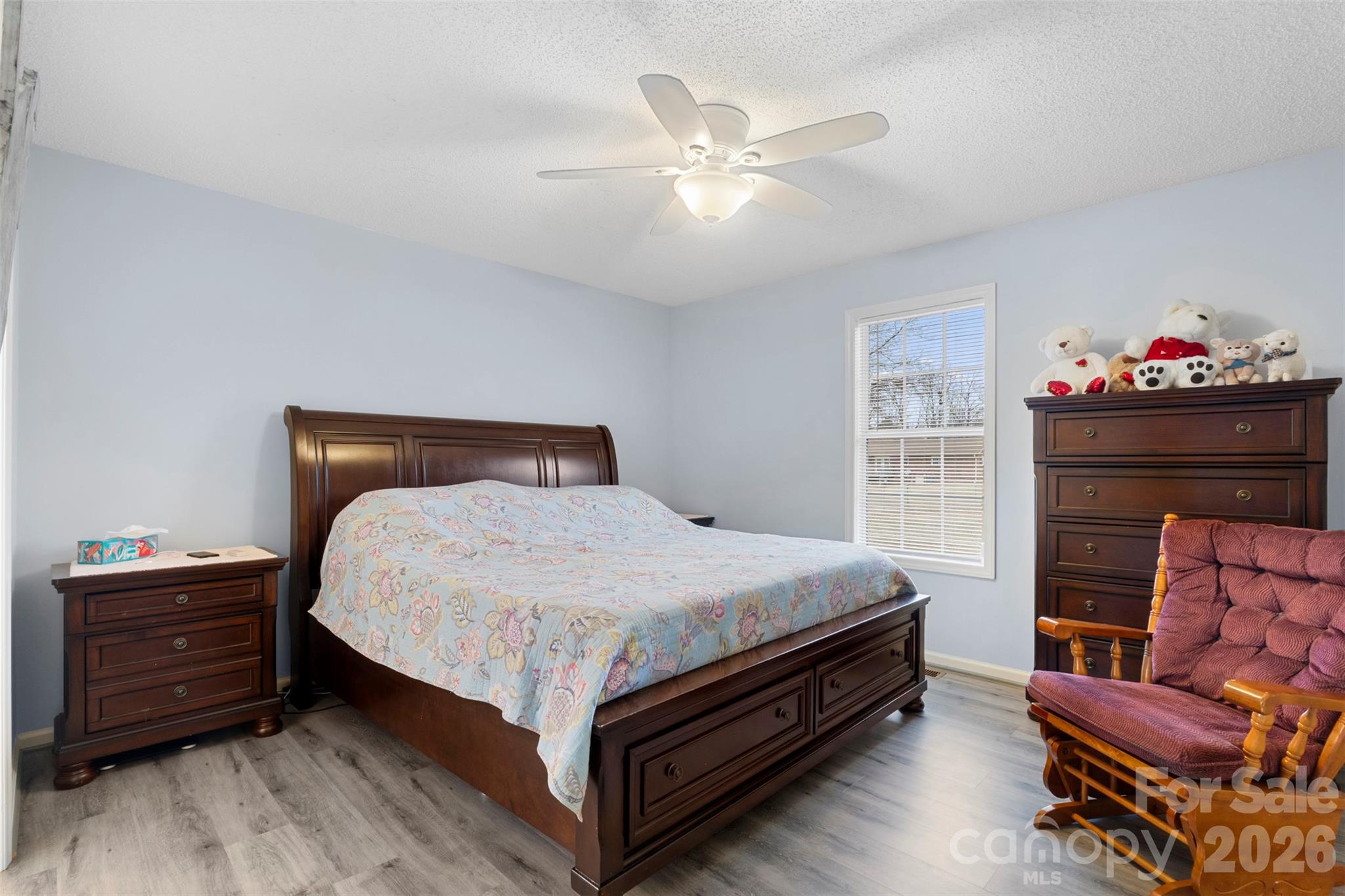 155 Sundial Street Lexington, NC 27295 - Photo 19 of 38 a bedroom with a bed and a dresser