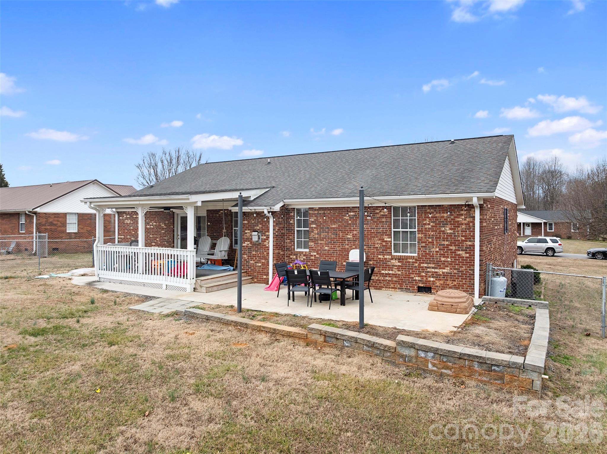 155 Sundial Street Lexington, NC 27295 - Photo 26 of 38 a view of a house with backyard porch and sitting area
