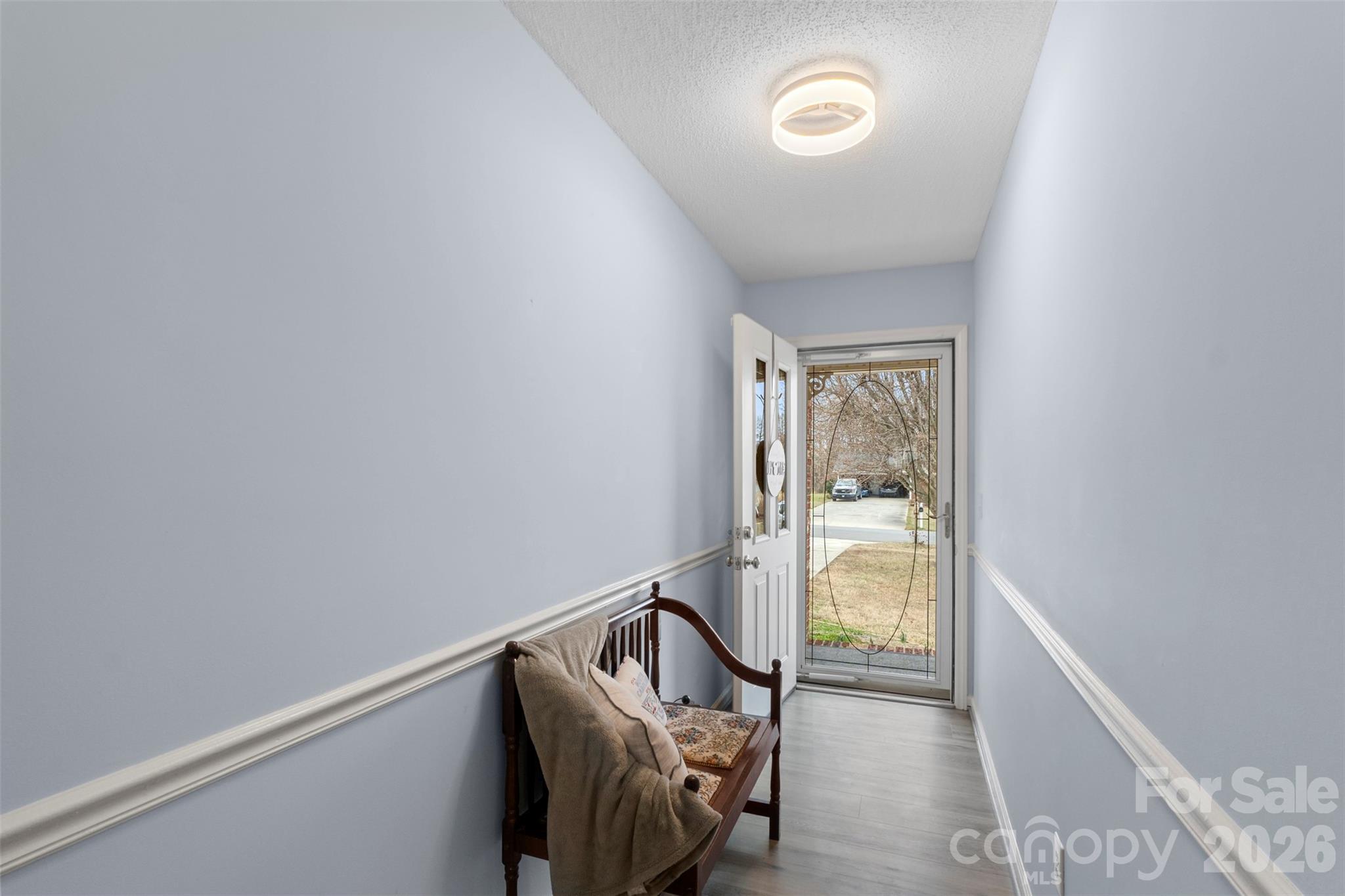 155 Sundial Street Lexington, NC 27295 - Photo 10 of 38 a view of an entryway with wooden floor