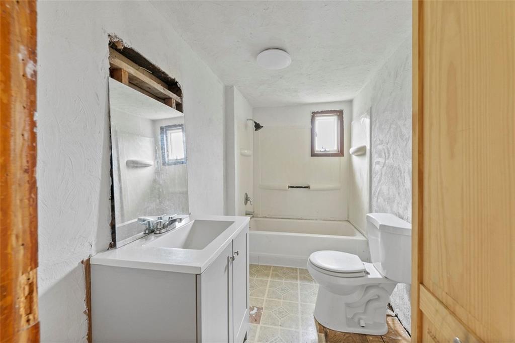 878 Bolden Road Smock, PA 15480 - Photo 18 of 23 a bathroom with a sink toilet and shower