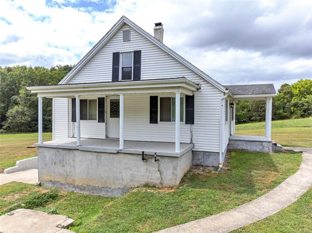 878 Bolden Road Smock, PA 15480 - Photo 2 of 23 a view of a house with a yard