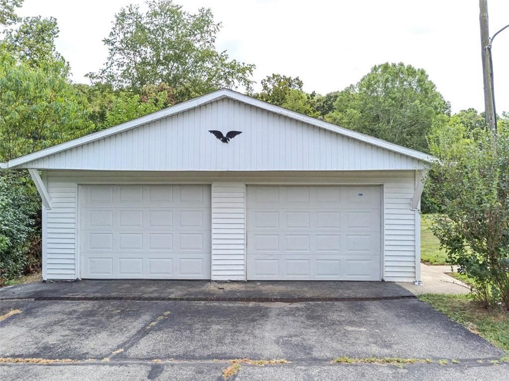 878 Bolden Road Smock, PA 15480 - Photo 4 of 23 a house with trees in the background