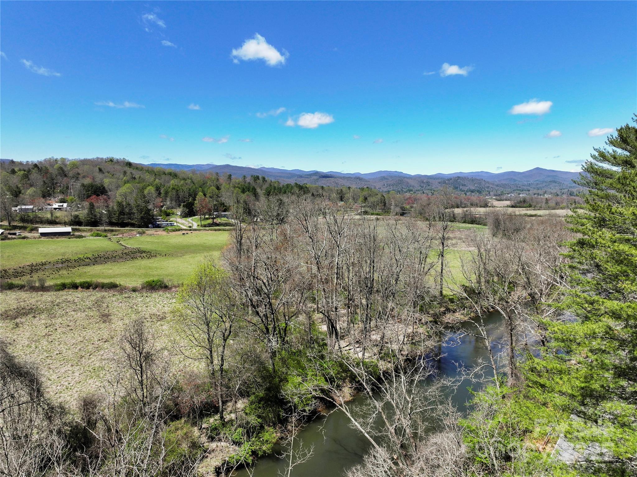 Three Three Mile Knob Road, Unit L1 Pisgah Forest, NC 28768 - Photo 11 of 11 a view of a lake with a mountain