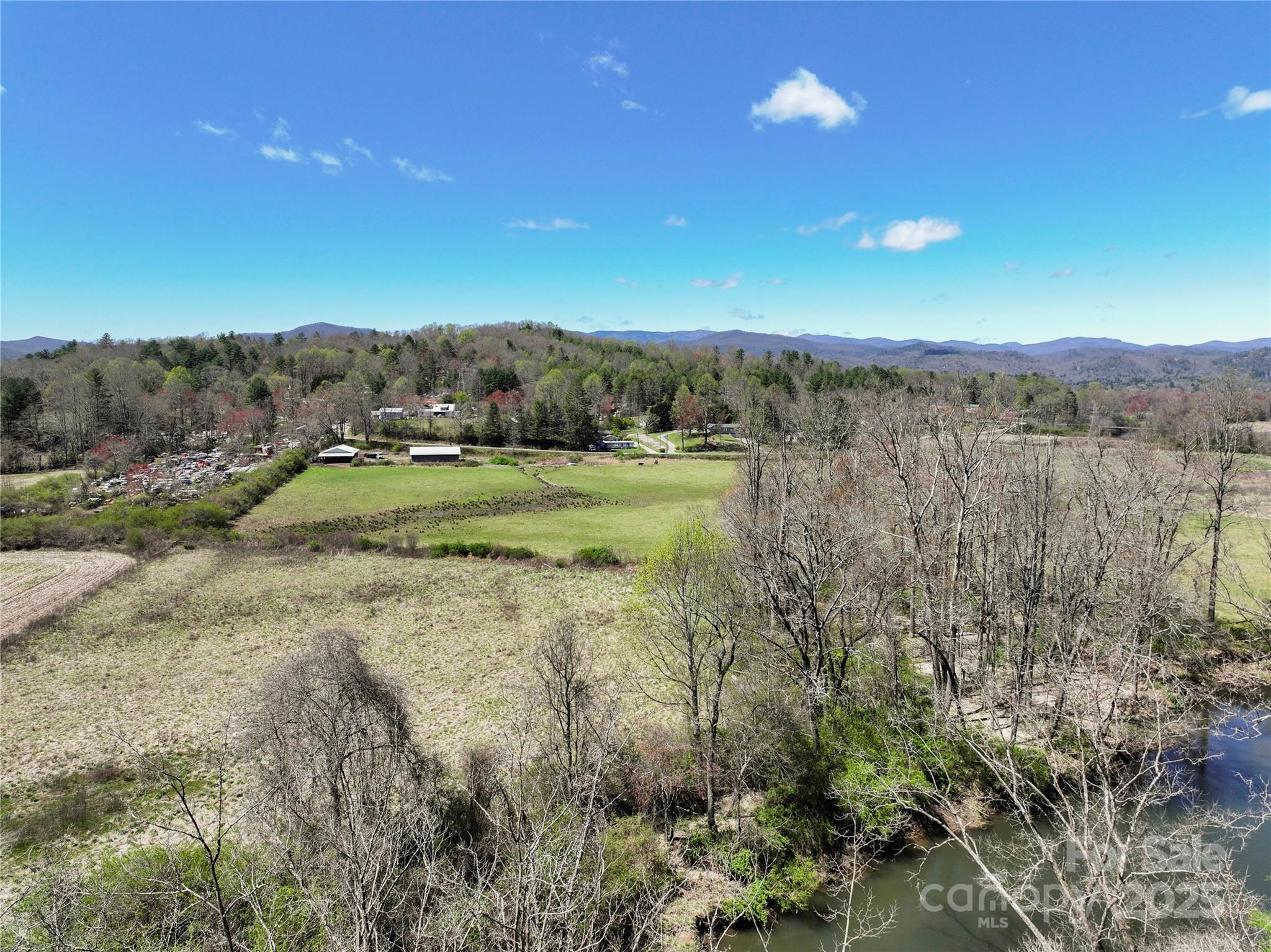 Three Three Mile Knob Road, Unit L1 Pisgah Forest, NC 28768 - Photo 10 of 11 a view of an outdoor space and a yard