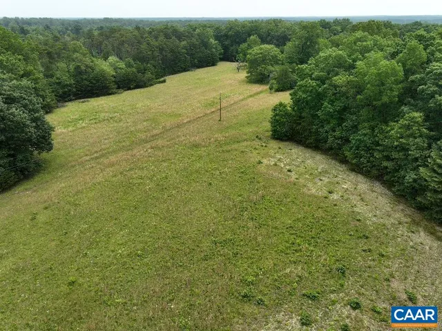 a view of a yard with an outdoor space