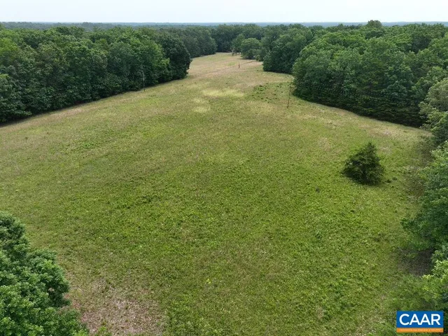 a view of a yard with an outdoor space
