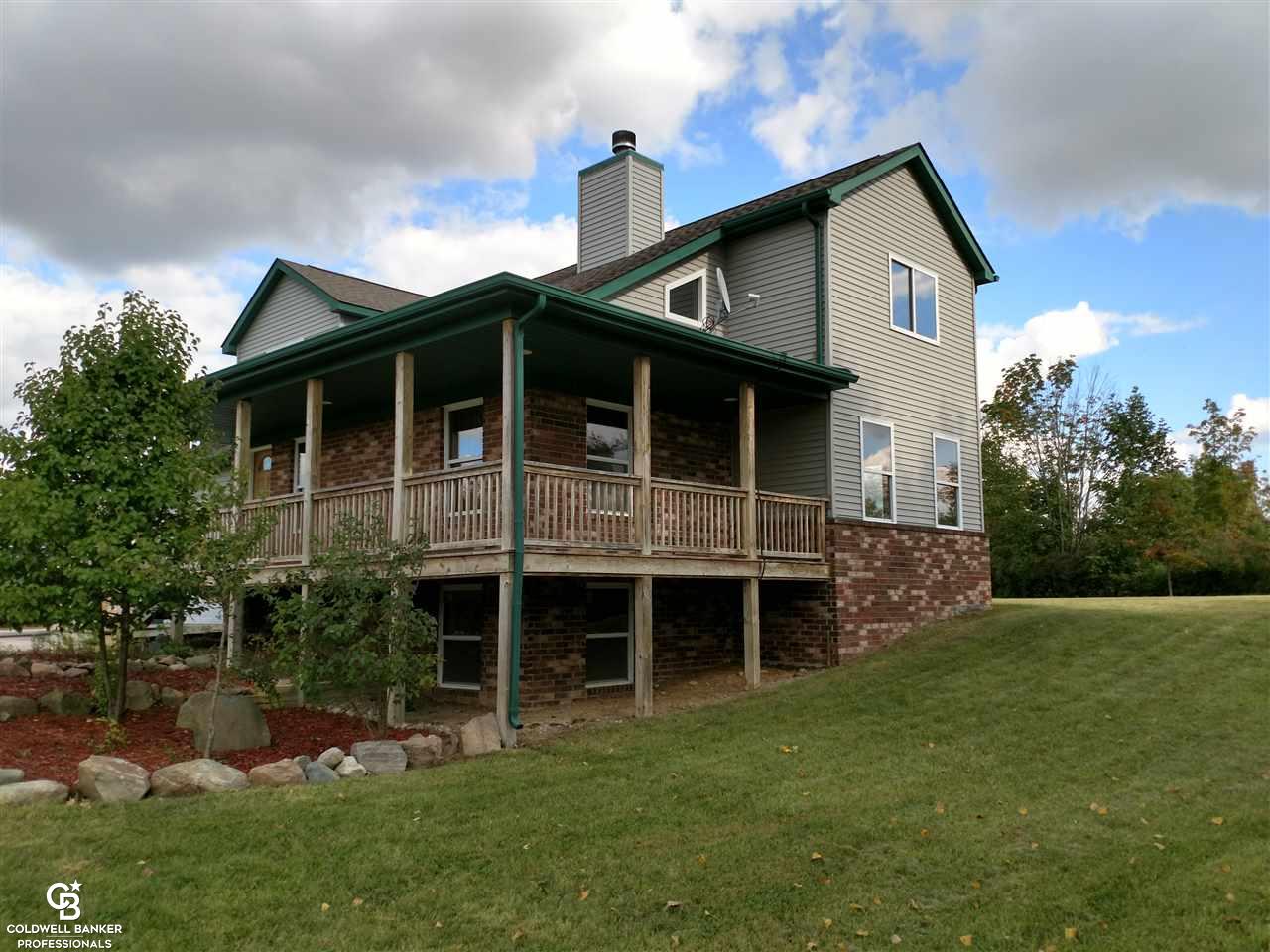 8276 Jorden Road Yale, MI 48097 - Photo 26 of 34 This is a front side view of the home.