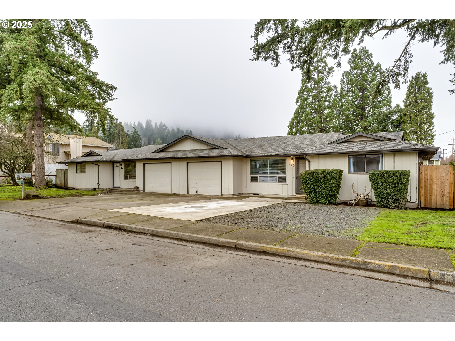 6865 Main Street Springfield, OR 97478 - Photo 1 of 48 a view of a yard and front view of a house