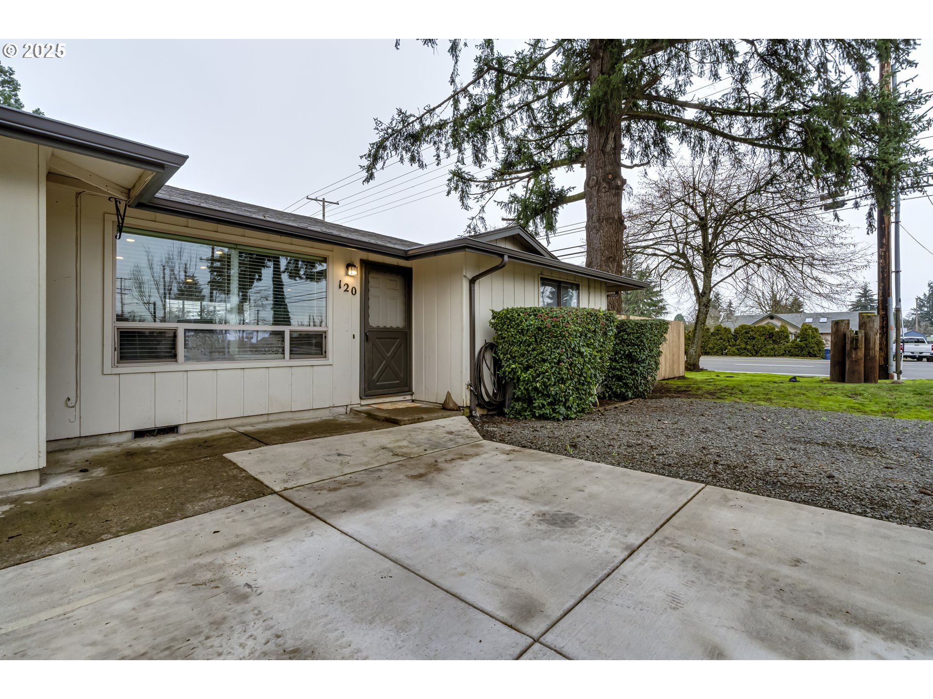 6865 Main Street Springfield, OR 97478 - Photo 2 of 48 a view of a house with a garden