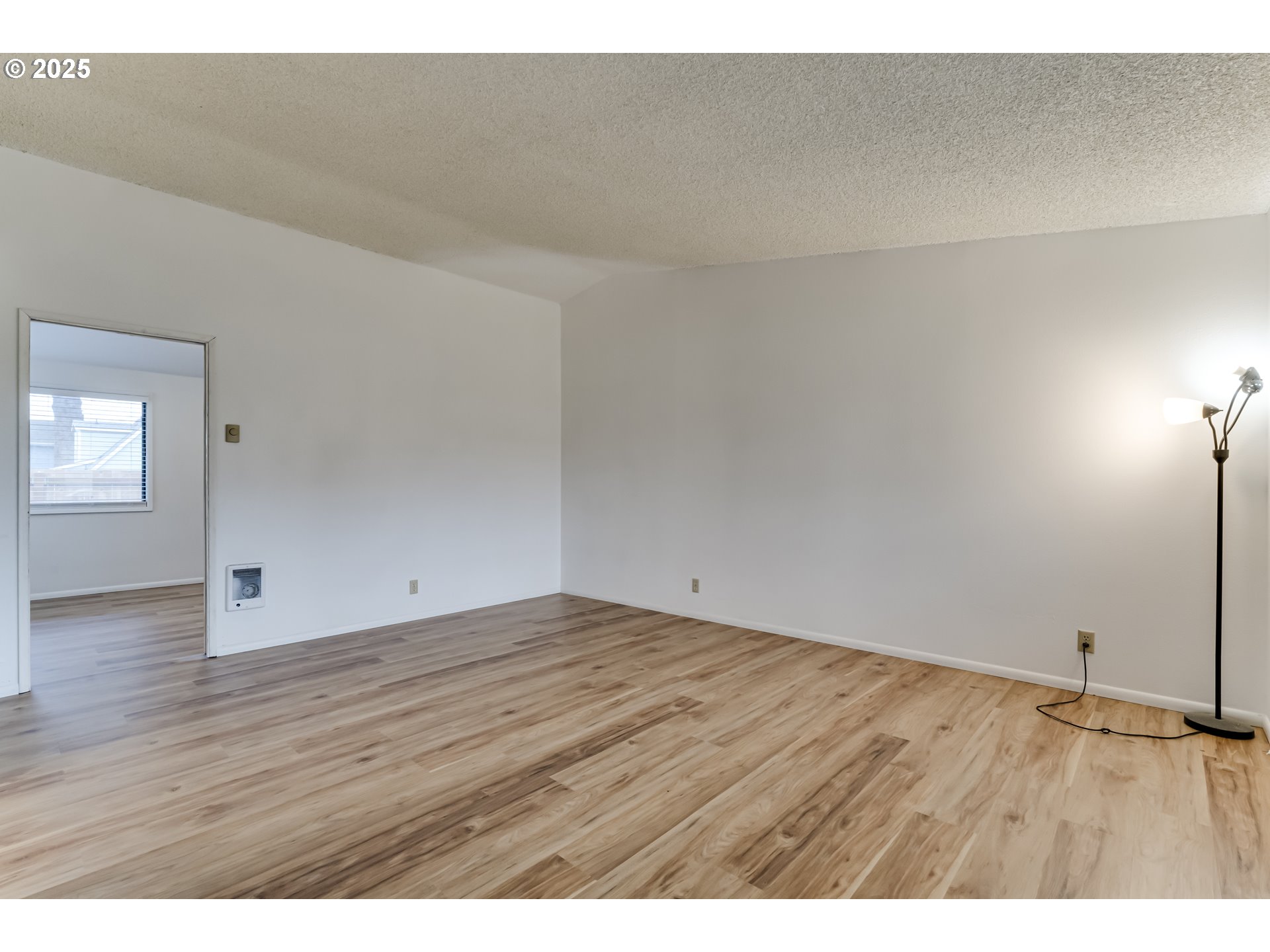 6865 Main Street Springfield, OR 97478 - Photo 28 of 48 a view of an empty room and wooden floor