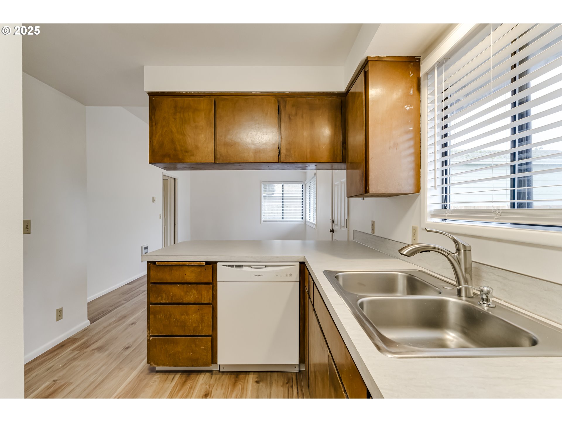 6865 Main Street Springfield, OR 97478 - Photo 38 of 48 a kitchen with a sink and a wooden cabinets