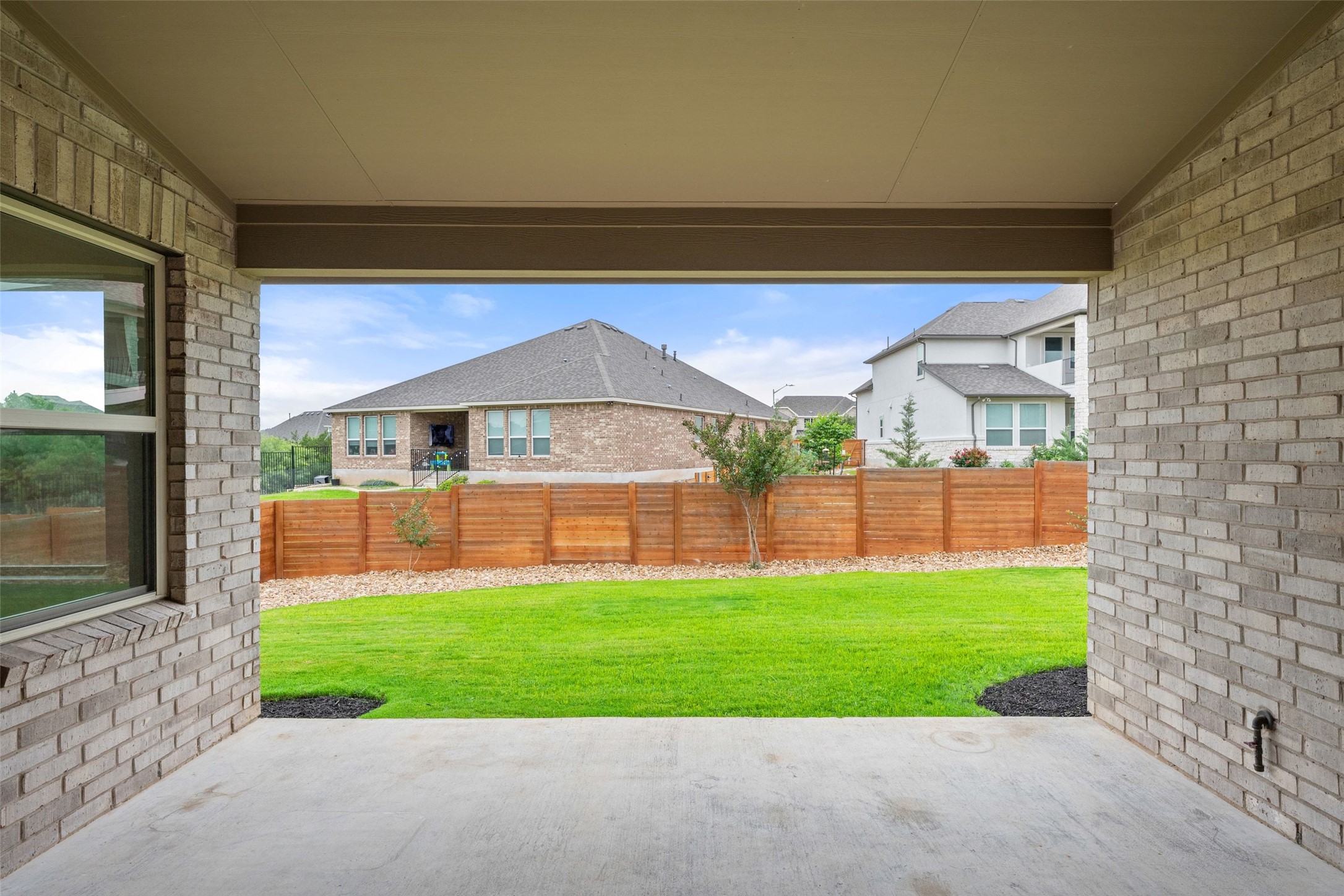 1513 Hinterwald Street Leander, TX 78641 - Photo 35 of 40 a front view of a house with a yard and garage
