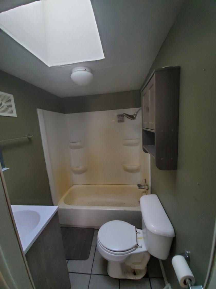 12463 West Haldane Road Forreston, IL 61030 - Photo 4 of 13 a bathroom with a toilet and a shower
