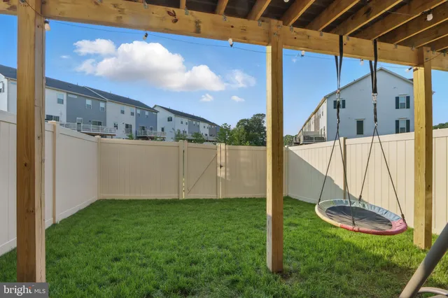 a view of a backyard with a barn