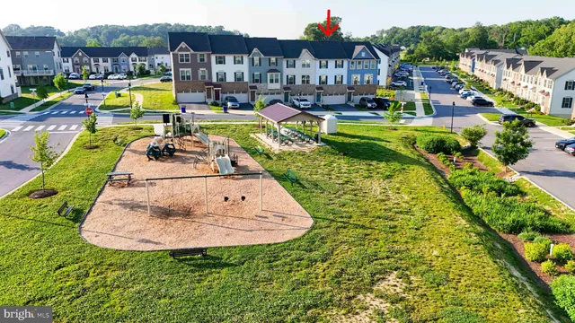 a view of a swimming pool with lounge chair