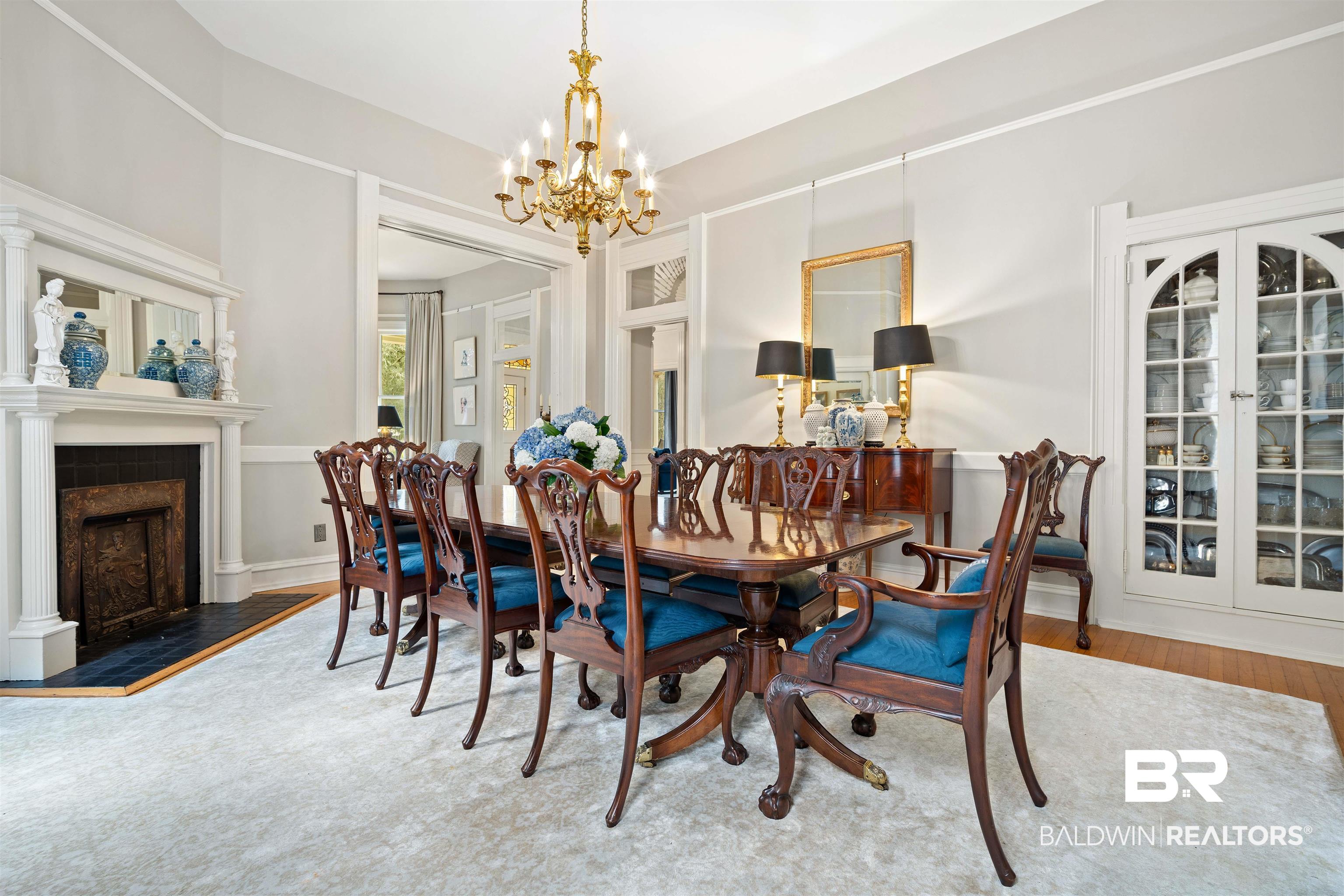 1314 Dauphin Street Mobile, AL 36604 - Photo 20 of 61 Dining room with hardwood flooring and a chandelier