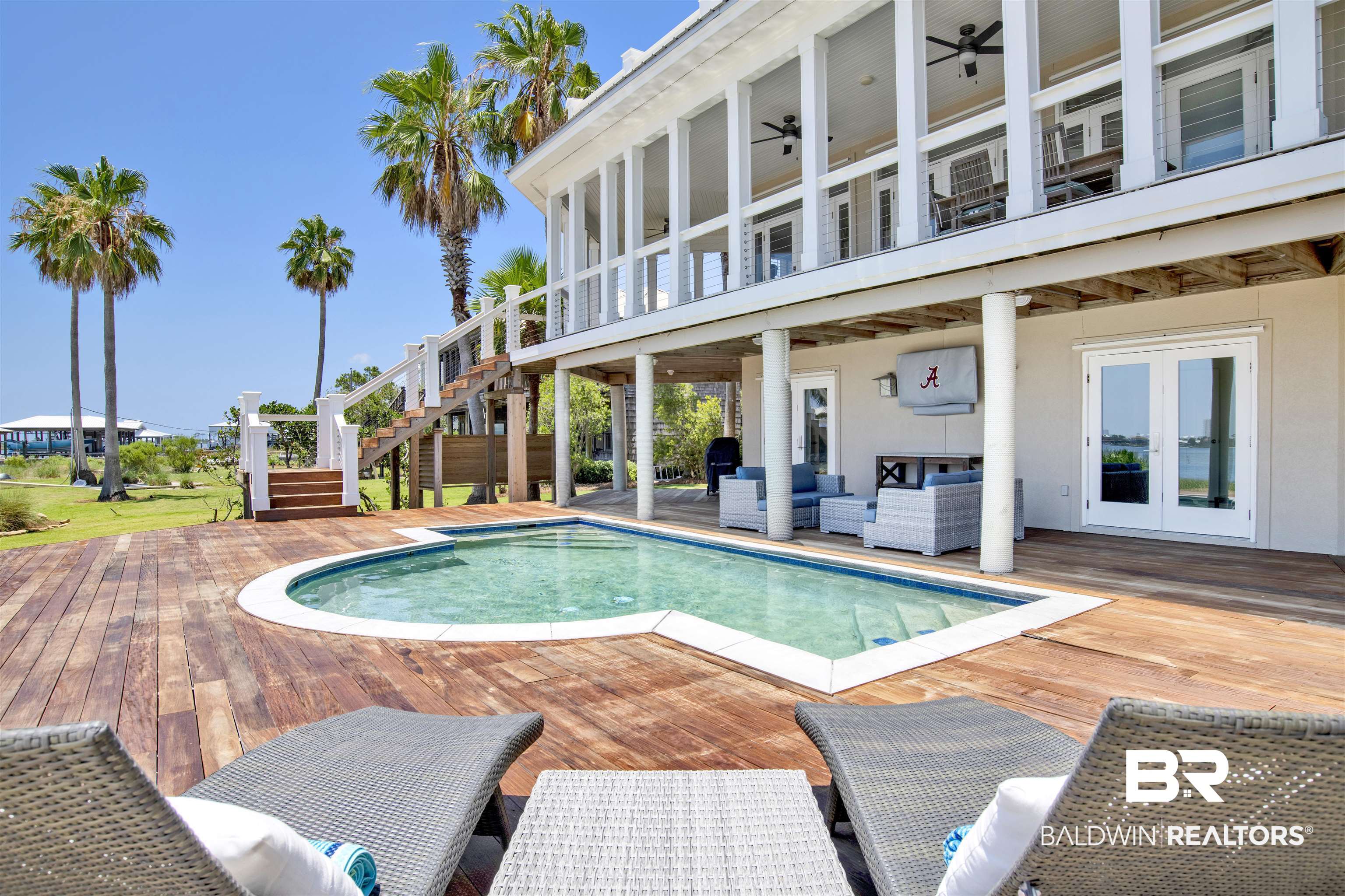 33400 River Road Orange Beach, AL 36561 - Photo 14 of 72 View of pool with an outdoor living space, a wooden deck, and french doors