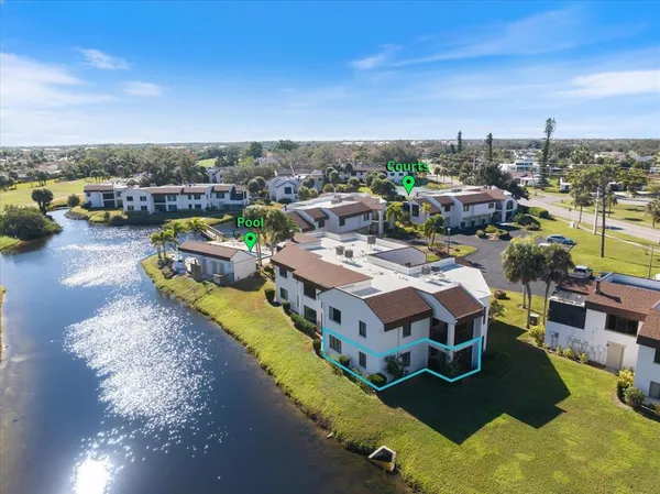 a aerial view of a house with a big yard