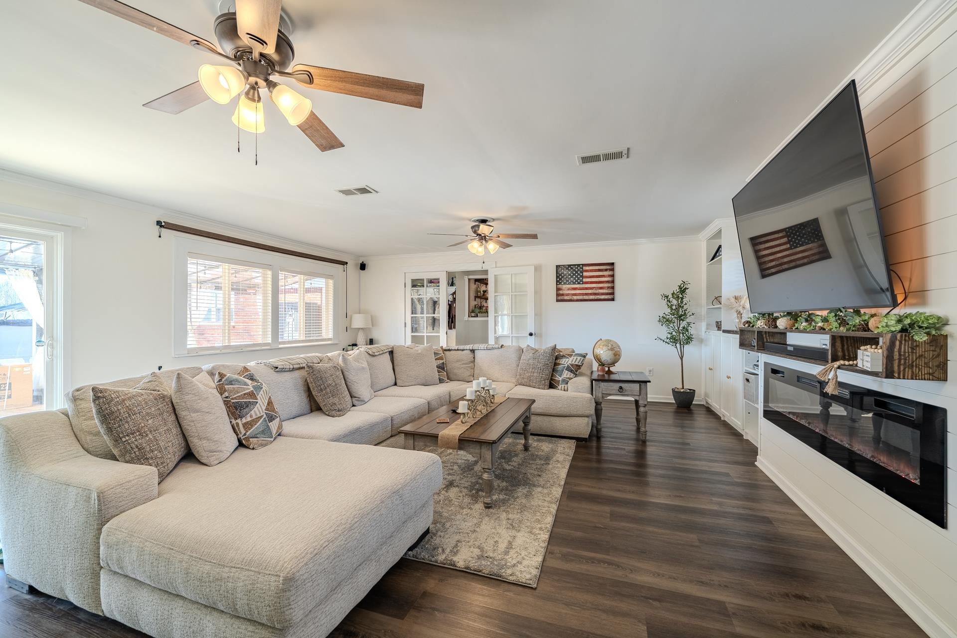 865 Pickett Road Stantonville, TN 38379 - Photo 18 of 40 a living room with furniture fireplace and flat screen tv