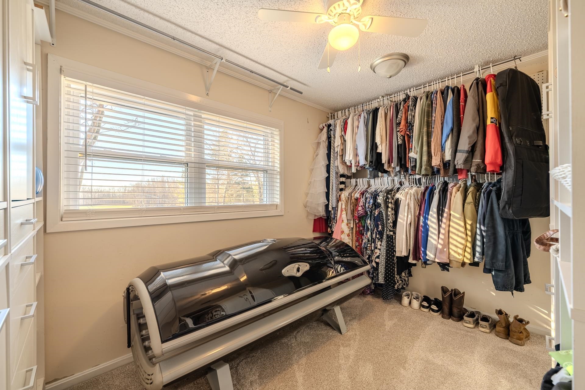865 Pickett Road Stantonville, TN 38379 - Photo 24 of 40 a view of walk in closet with clothes and shoes