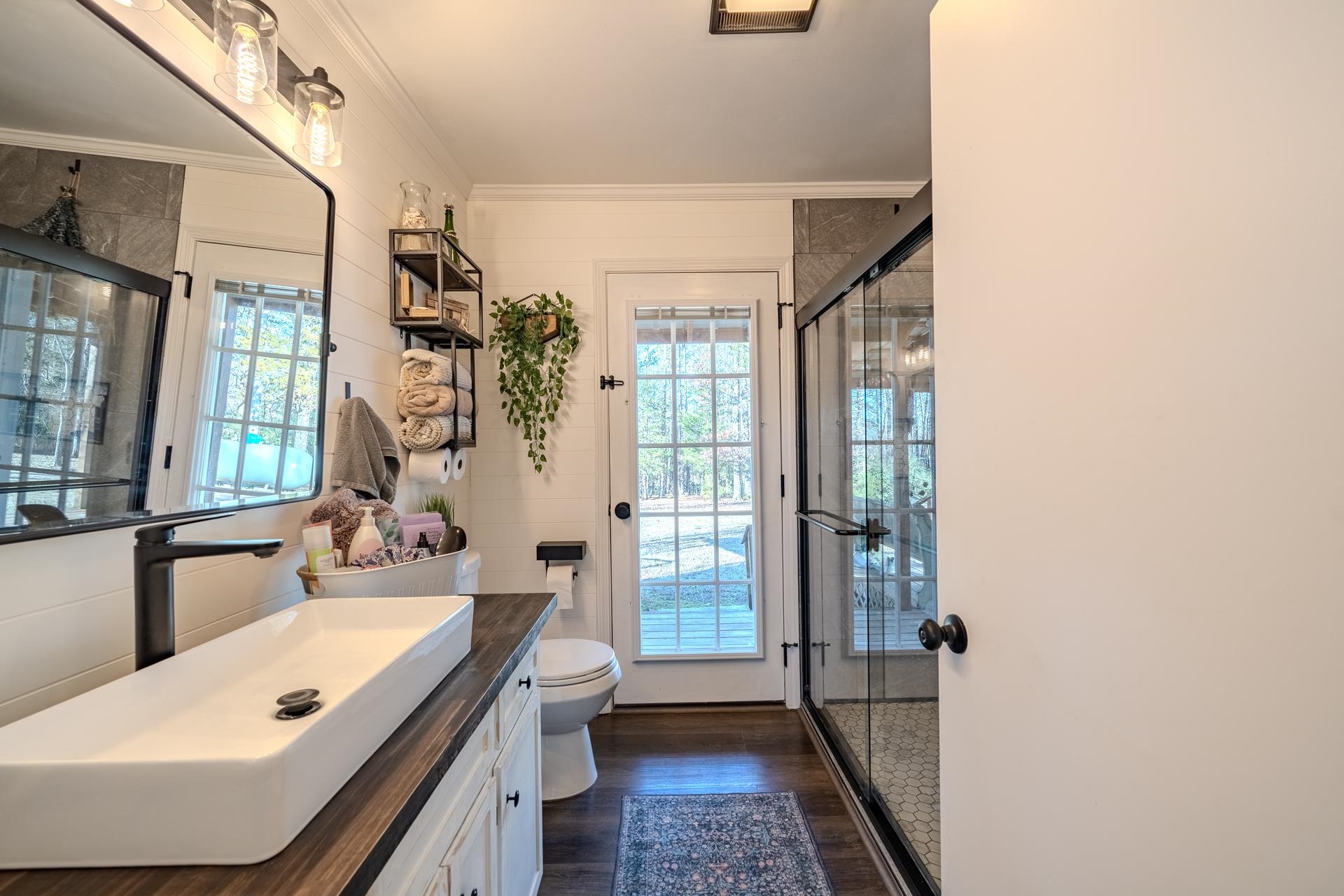 865 Pickett Road Stantonville, TN 38379 - Photo 25 of 40 a bathroom with a tub sink toilet and a shower