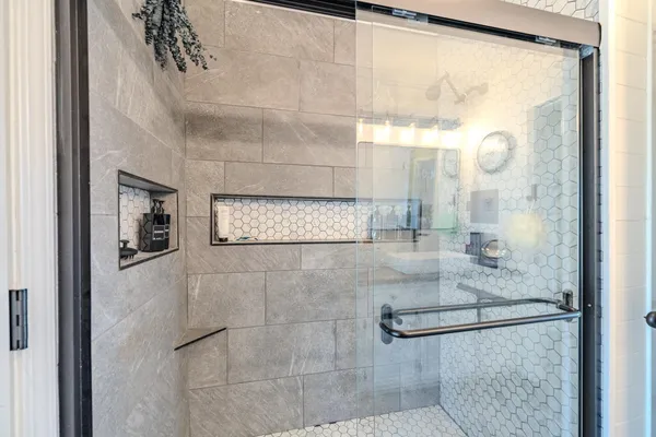 a view of a chairs and table in a patio