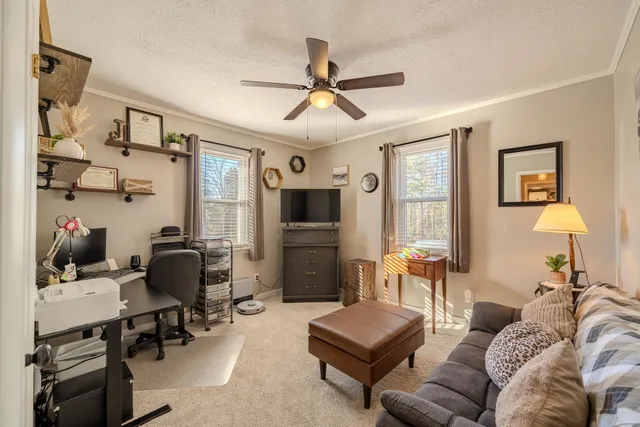 a room with cabinets and flat screen tv