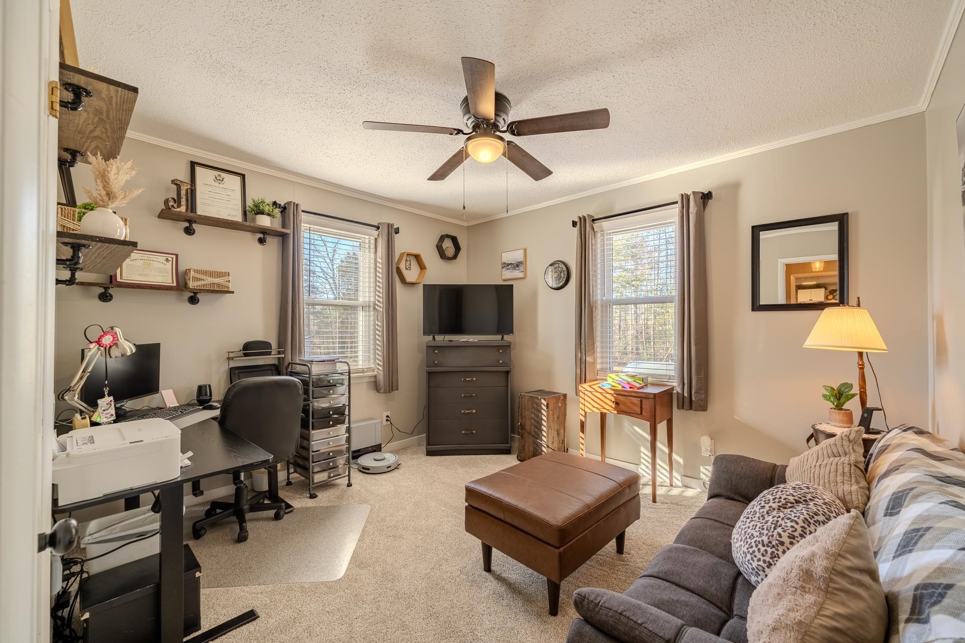 865 Pickett Road Stantonville, TN 38379 - Photo 31 of 40 a living room with furniture and a flat screen tv