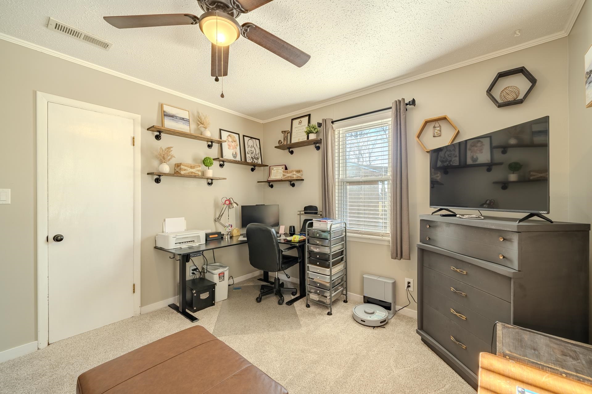 865 Pickett Road Stantonville, TN 38379 - Photo 32 of 40 Office area with a textured ceiling, ornamental molding, light colored carpet, and ceiling fan