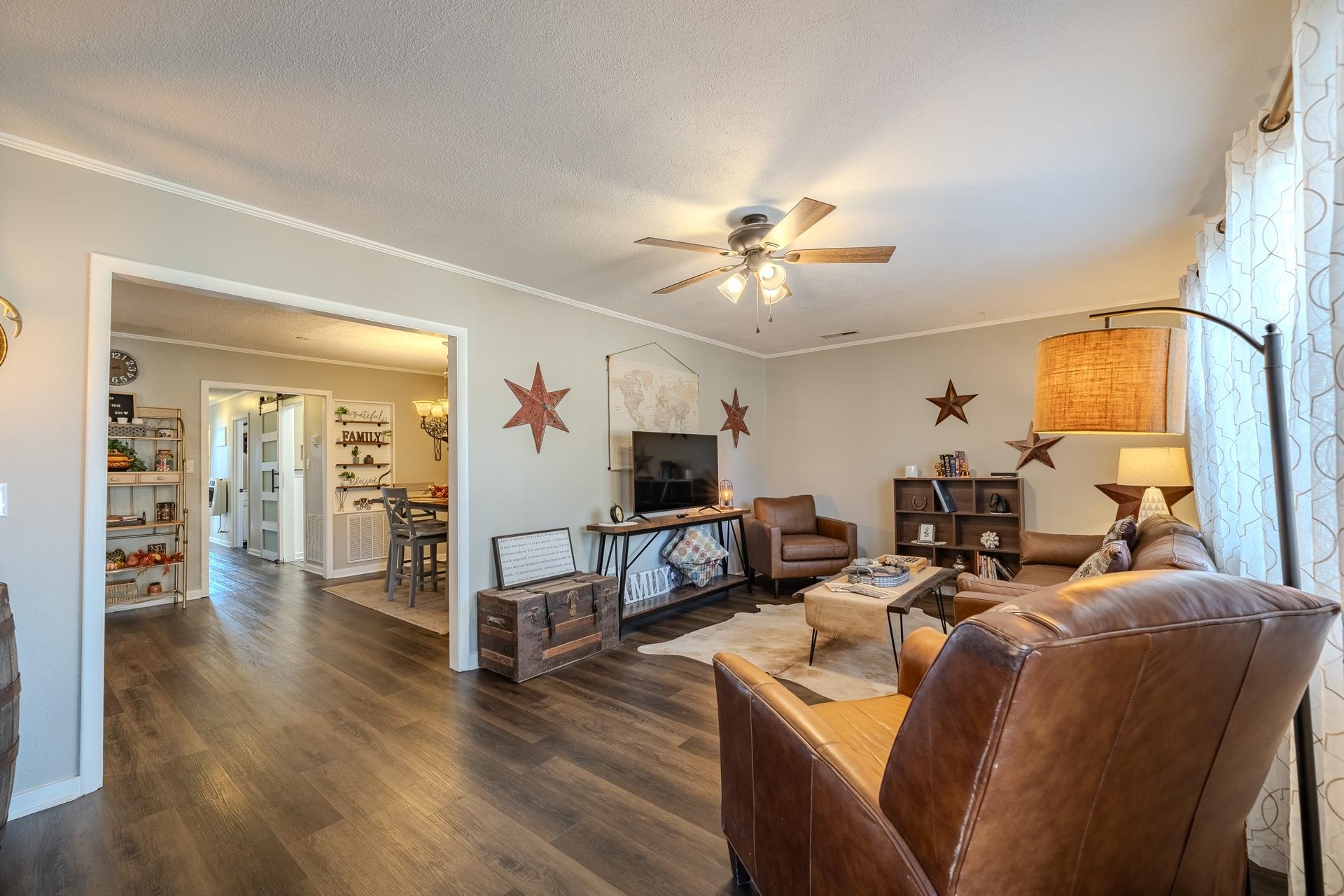 865 Pickett Road Stantonville, TN 38379 - Photo 10 of 40 a living room with furniture and a flat screen tv