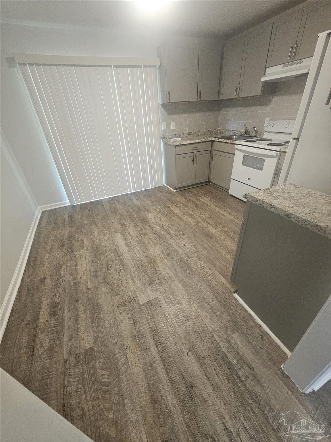 751 Tumbleweed Trail, Unit A Pensacola, FL 32534 - Photo 4 of 13 a room with storage and utility