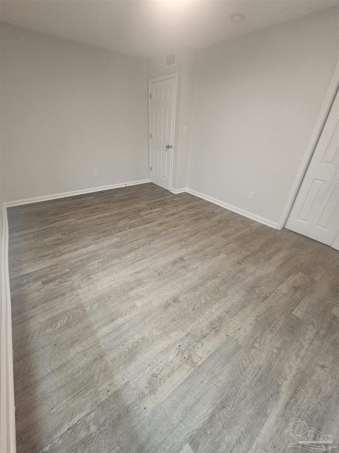 751 Tumbleweed Trail, Unit A Pensacola, FL 32534 - Photo 6 of 13 a view of an empty room