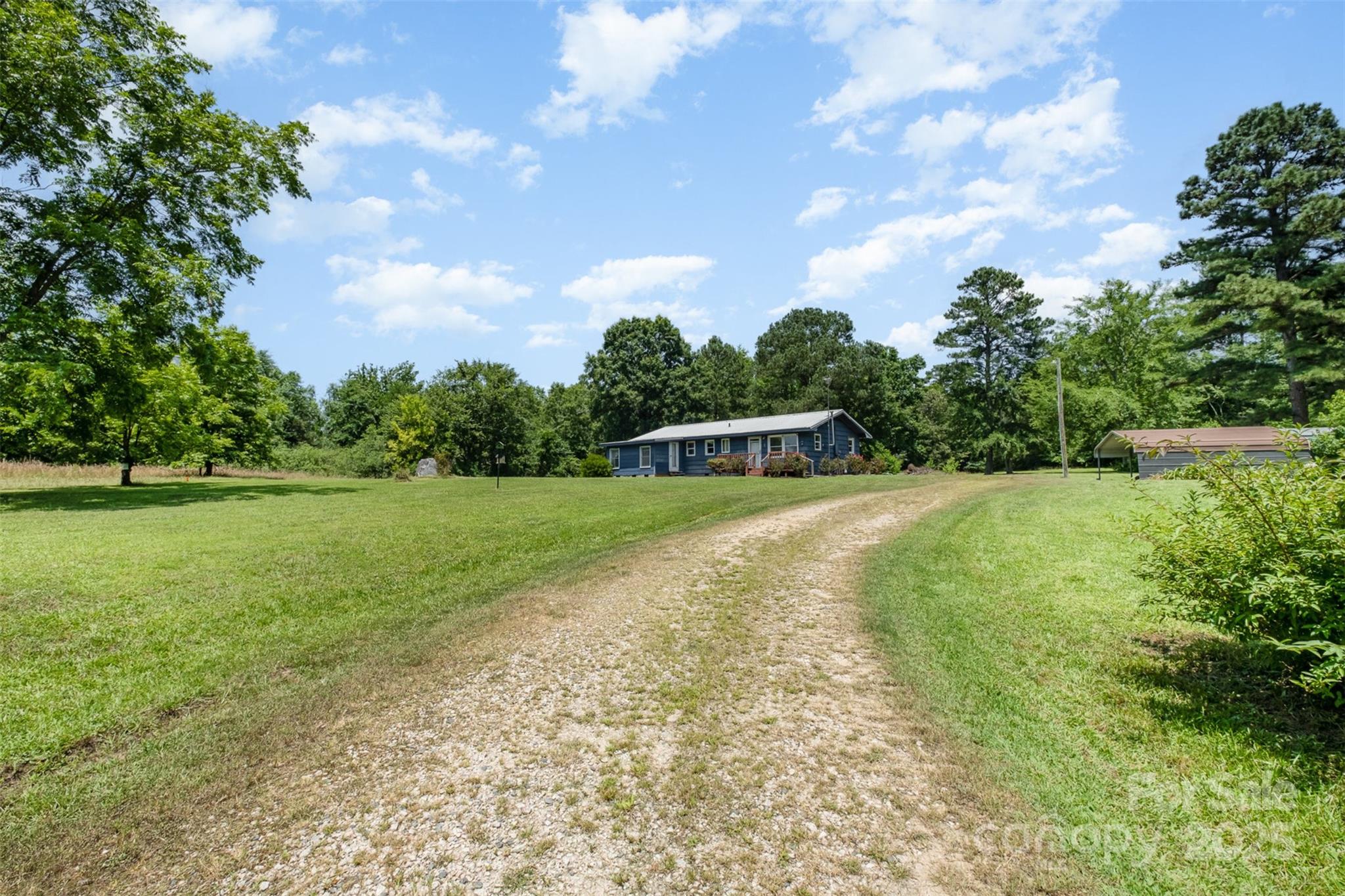 1043 Sid Davis Road Chester, SC 29706 - Photo 2 of 25 a view of a house with a yard