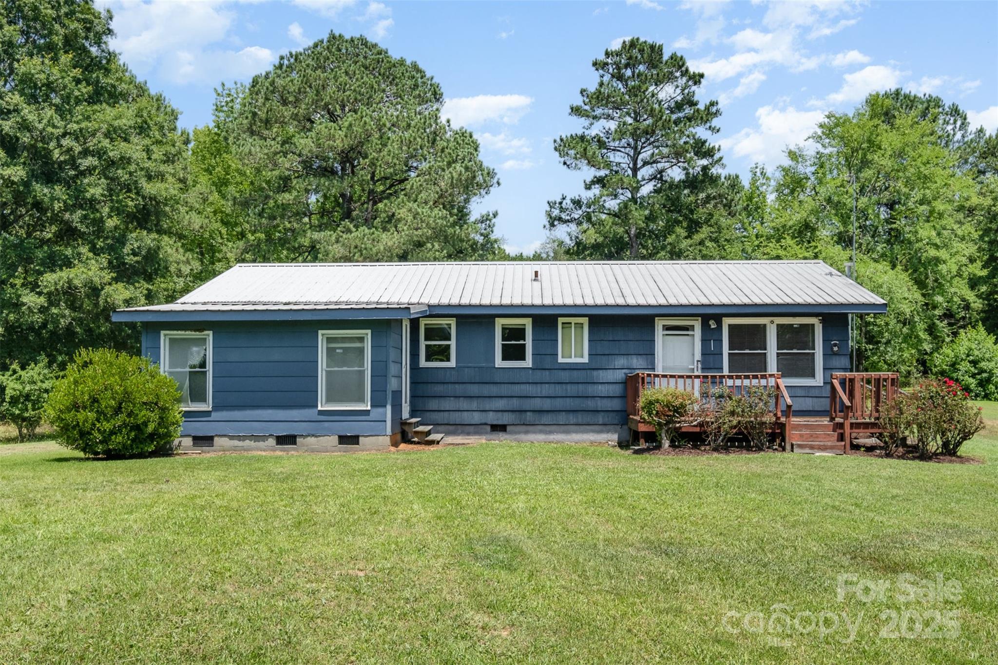1043 Sid Davis Road Chester, SC 29706 - Photo 3 of 25 a front view of a house with garden