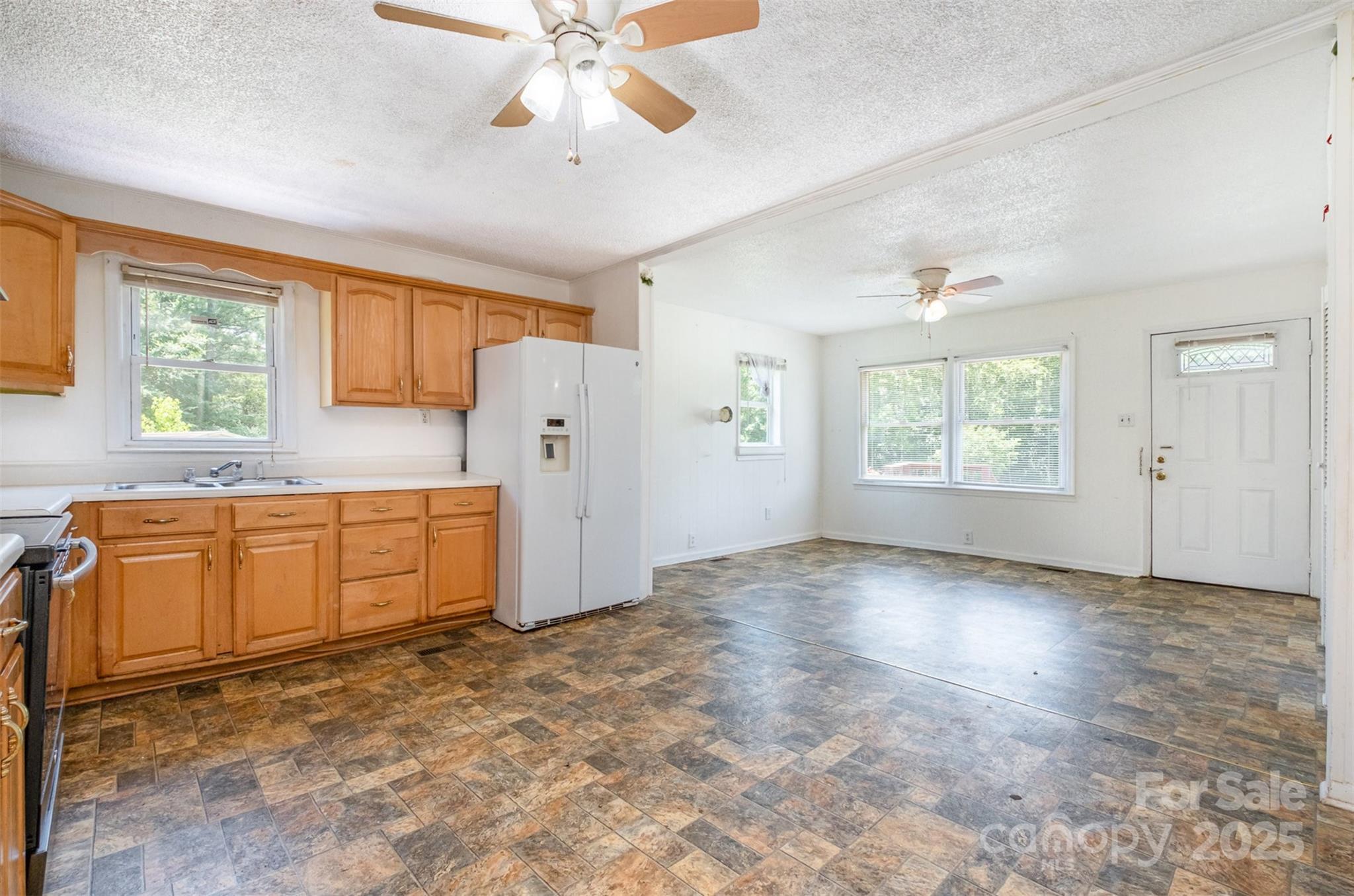 1043 Sid Davis Road Chester, SC 29706 - Photo 5 of 25 an empty room with window and cabinet