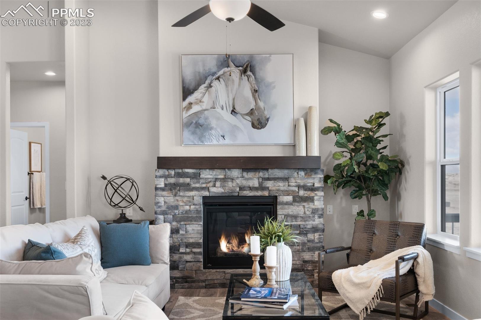2970 Hoofprint Road Peyton, CO 80831 - Photo 6 of 42 Great Room Gas & Rock Fire Place