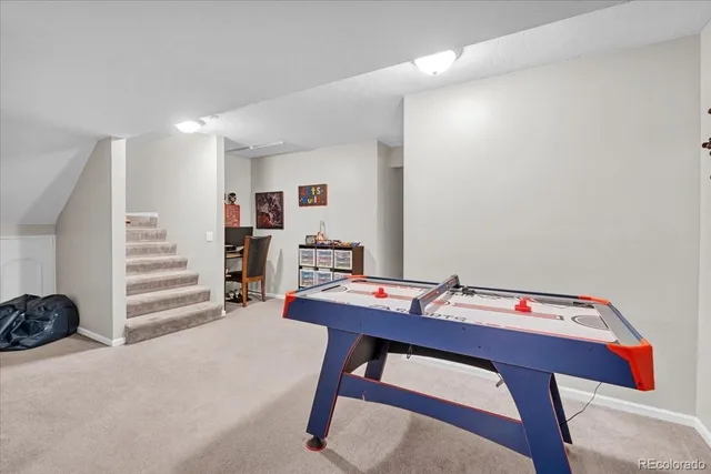 a view of a workspace with furniture